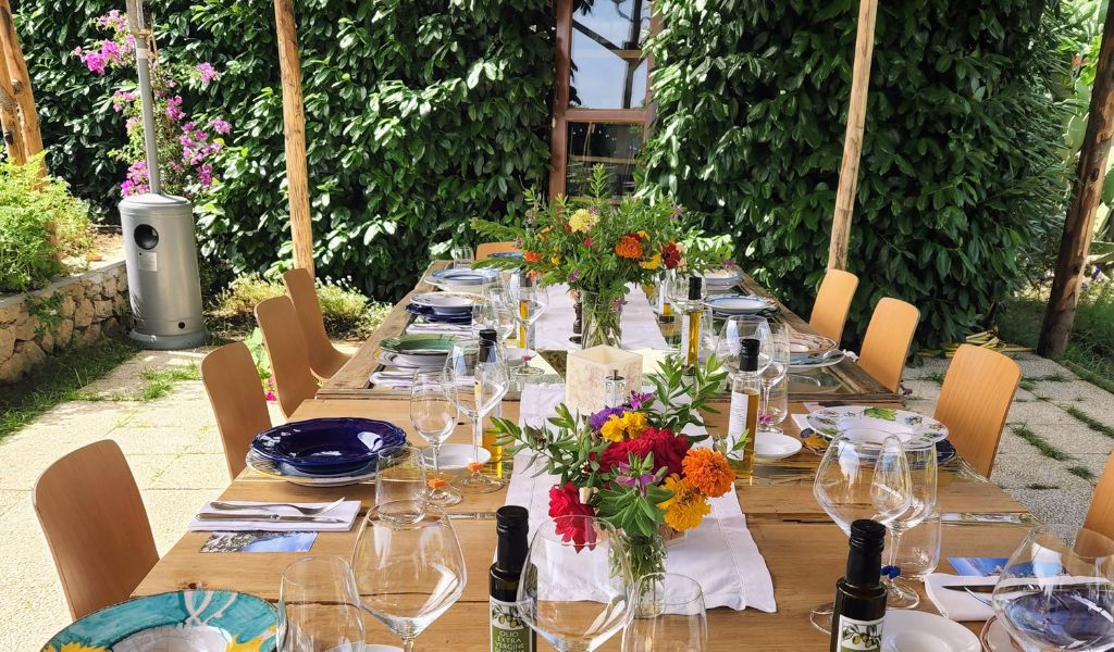 an outdoor dining table in italy