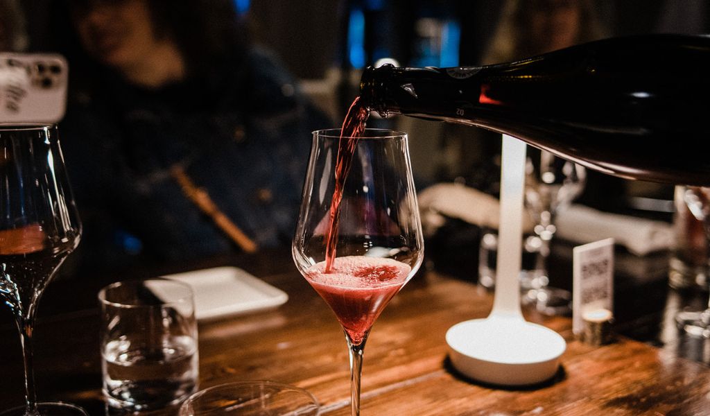 pouring lambrusco in emilia-romagna
