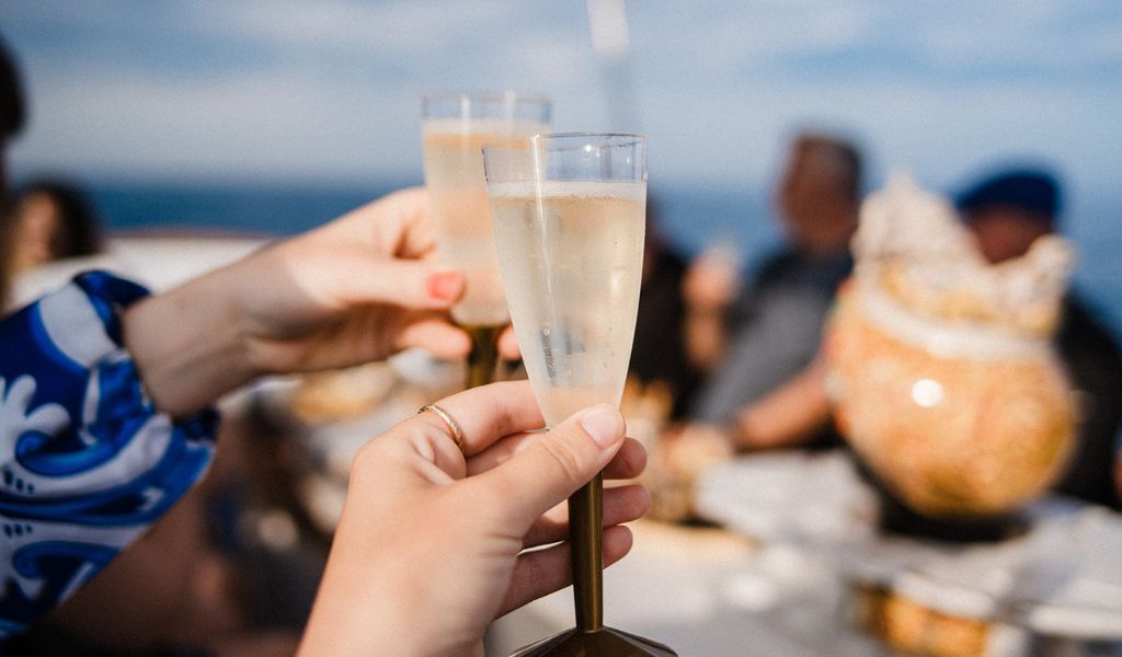 sparkling wine on a boat trip in sicily