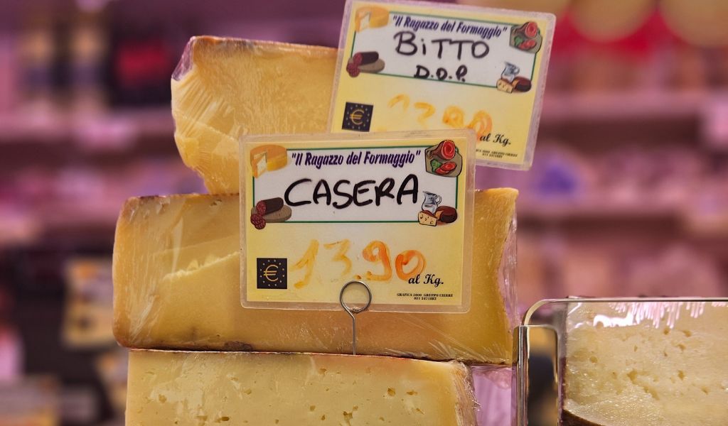 bitto cheese at a cheese stall in italy